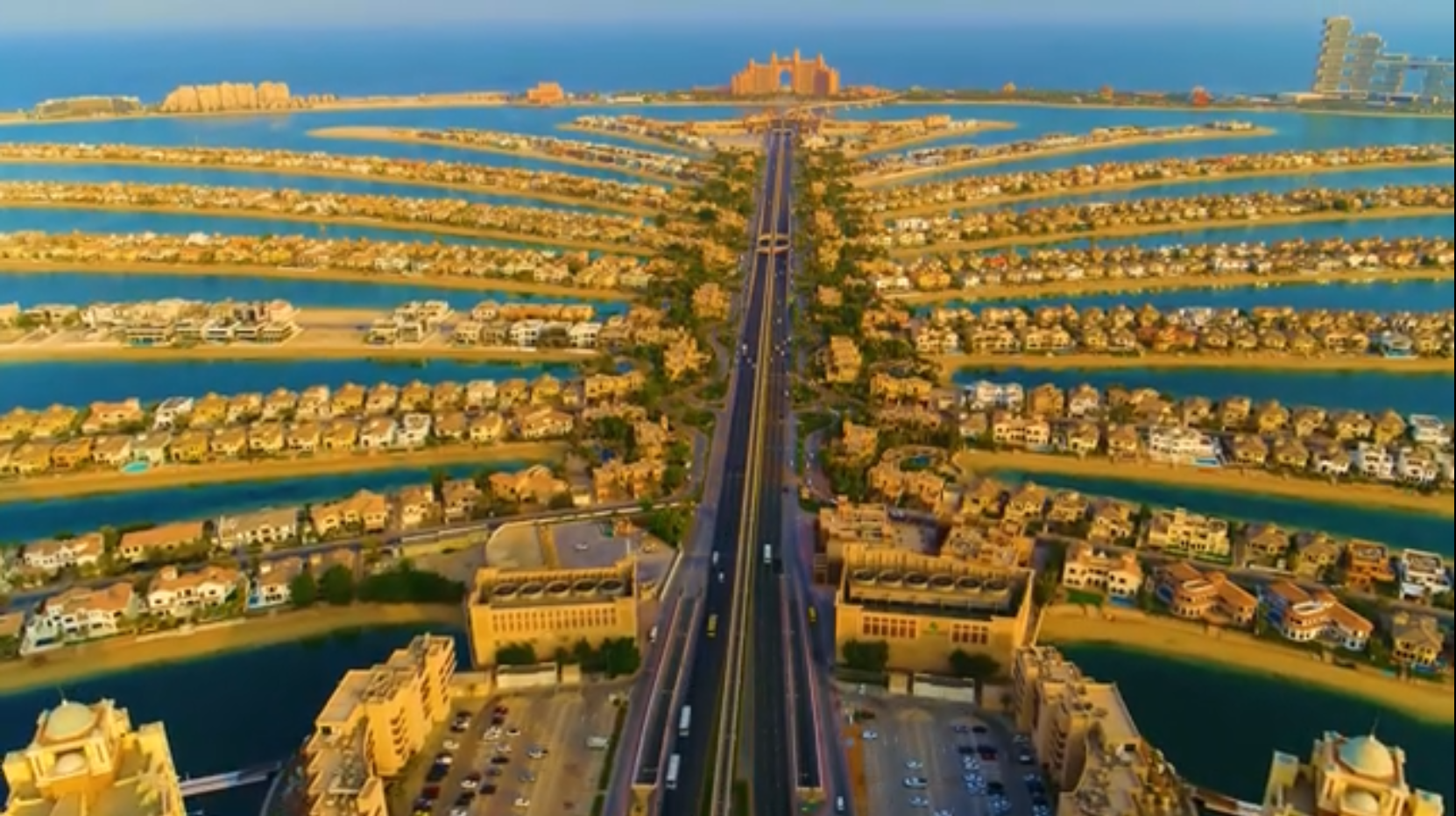 Aerial view down the Palm Jumeirah trunk with Atlantis in the distance