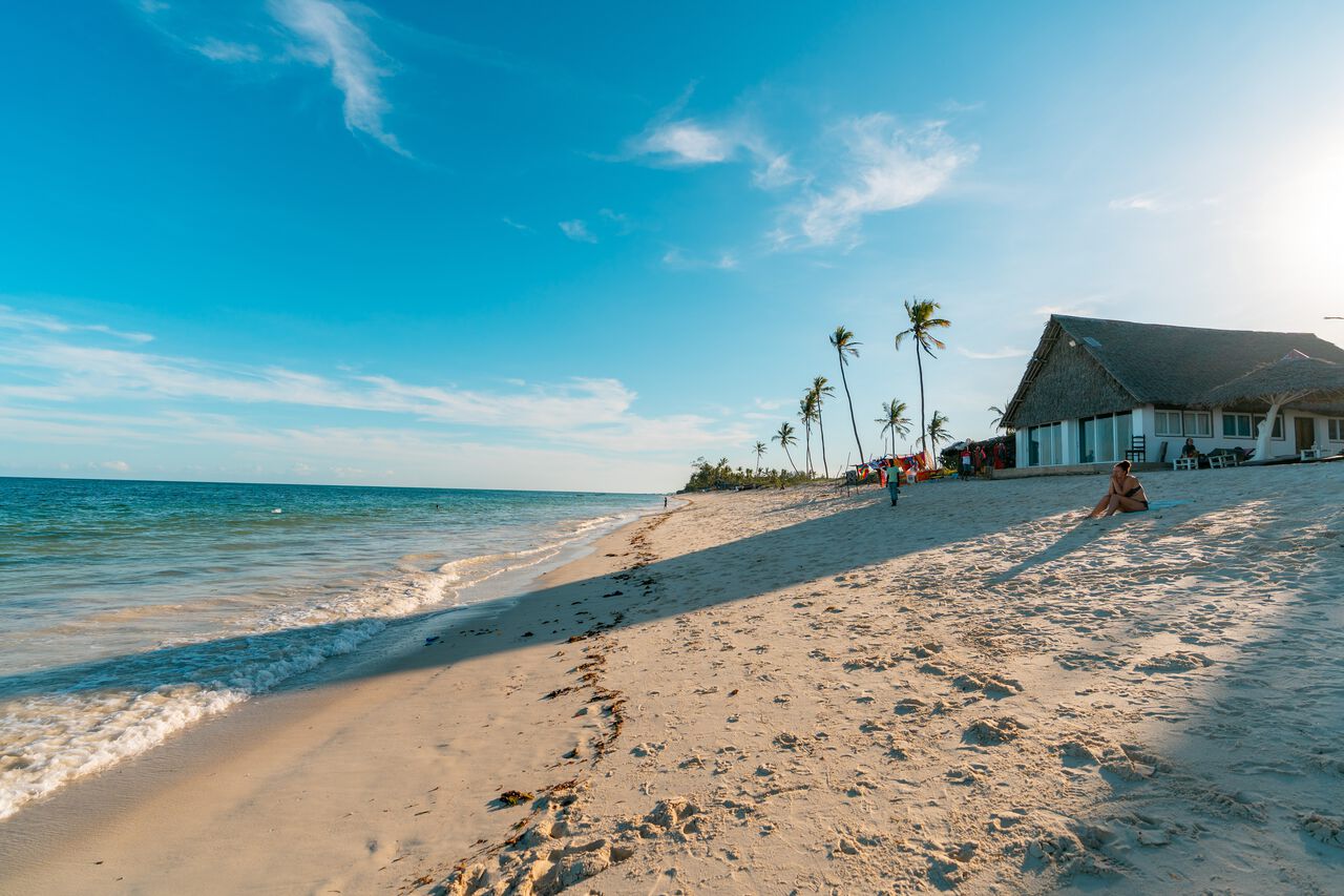 Sunset on Diani Beach with fishing boats offshore