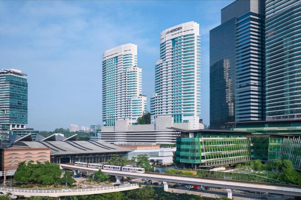 Le Méridien Kuala Lumpur towers rising above KL Sentral station
