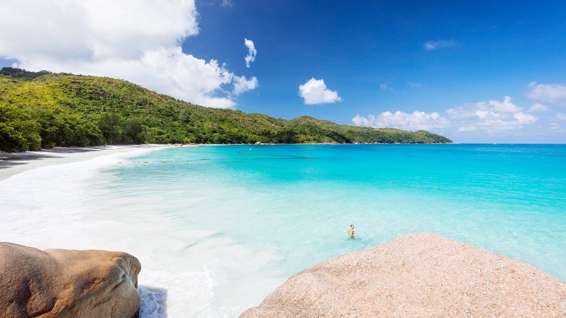 Anse Lazio beach on Praslin with turquoise water and granite boulders
