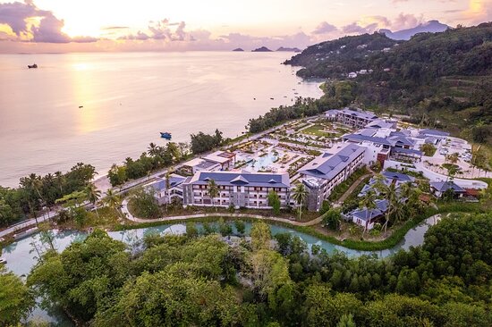 Aerial view of Canopy by Hilton Seychelles resort at sunset
